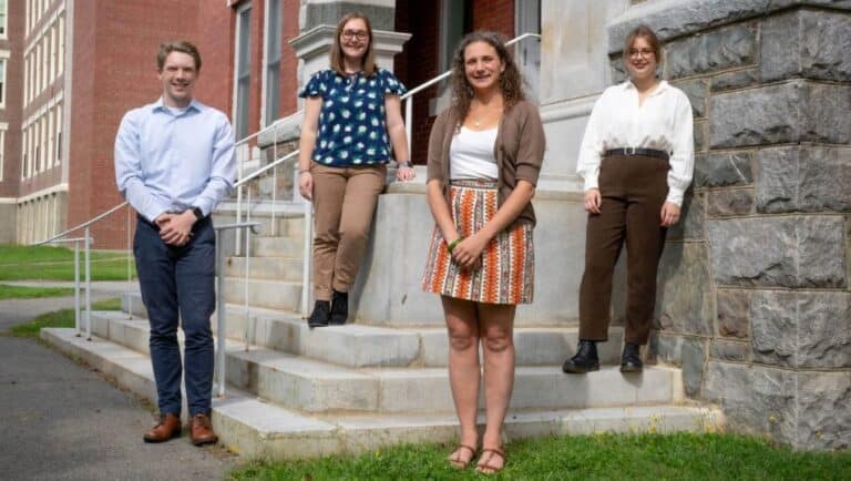 MHC fellows on steps outside Lord Hall